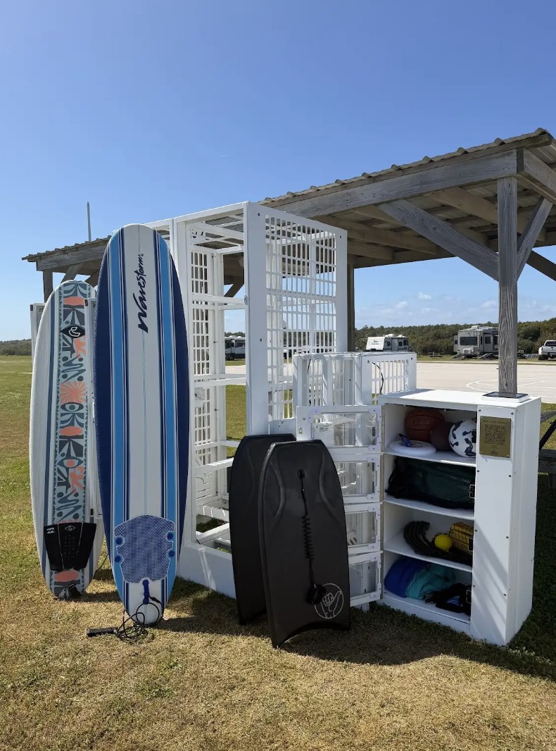 DAB locker open with surfboards and gear at Turtle Beach